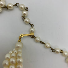 Load image into Gallery viewer, Vintage Trifari Faux Pearl Multistrand Torsade Gold Tone Setting Inlaid Clear Rhinestone Necklace
