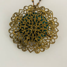 Load image into Gallery viewer, Vintage Brass Tone Dark Green Lucite Disc Brass Flower Filigree Bead Rhinestone Necklace
